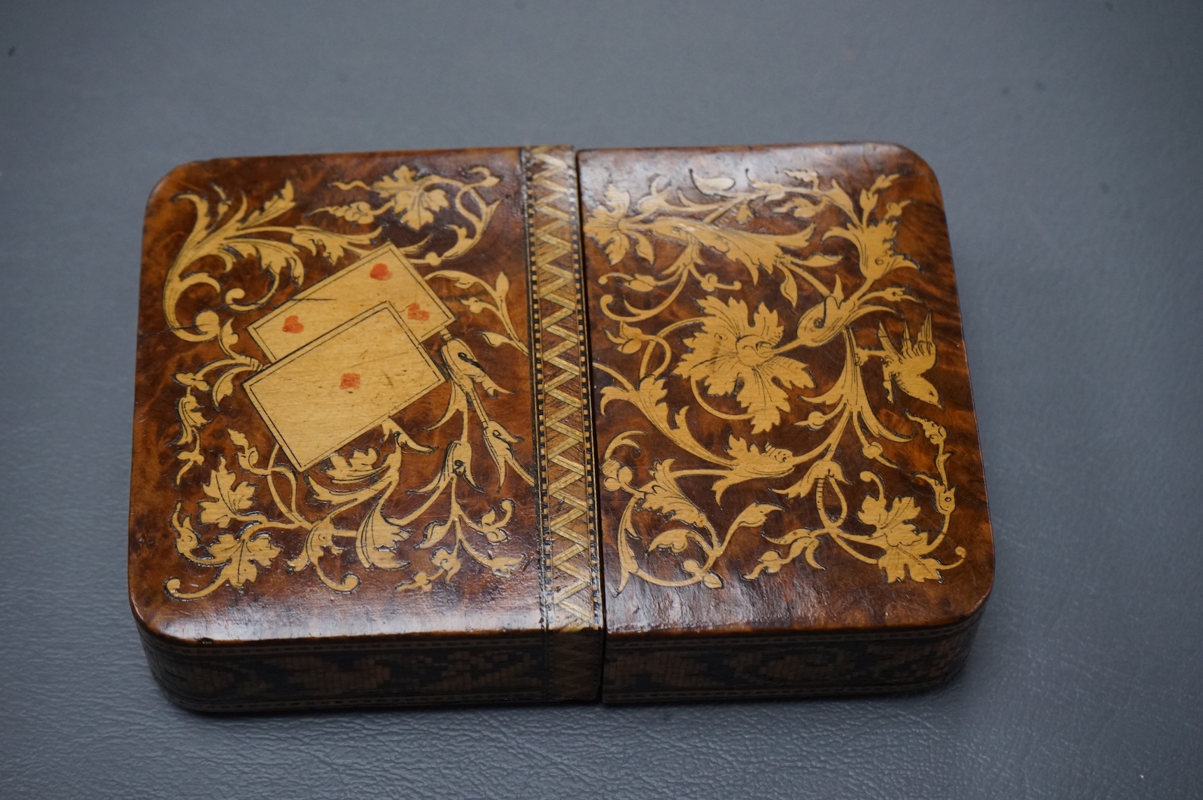 An Italian Sorrento ware playing card case, 12cm high